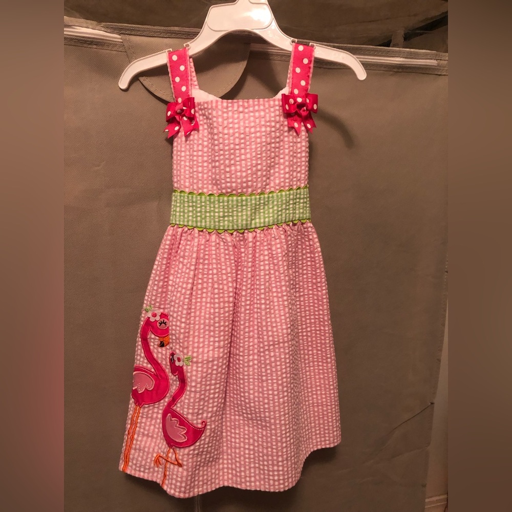Pink seersucker toddler girl dress with flamingo design